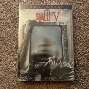 Unopened Saw Directors Cut DVD with bonus DVD Texas Chainsaw Massacre